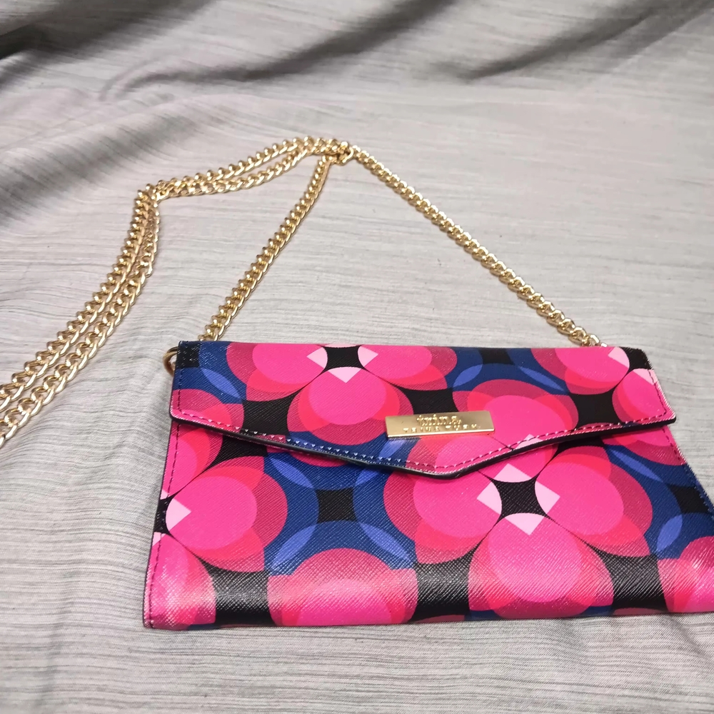 Sold.  Trina Turk Pink and Black Clutch with Gold Chain